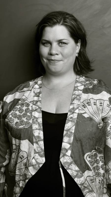 Black and white portrait photo of Katy Brand.